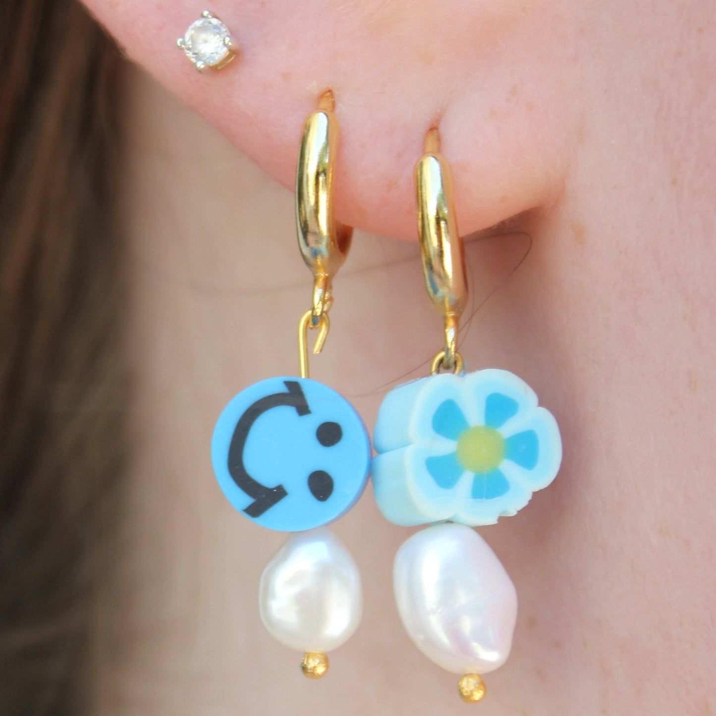 blue smiley face freshwater pearl huggies