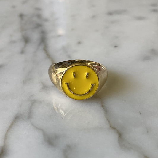 yellow smiley ring